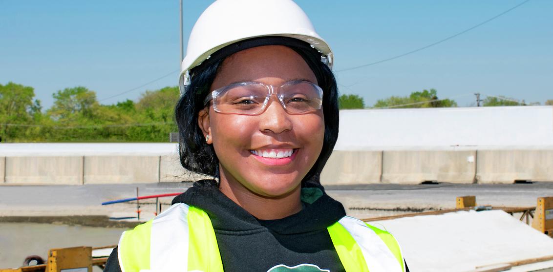 Kelina Evans in hard hat, safety vest and PPE