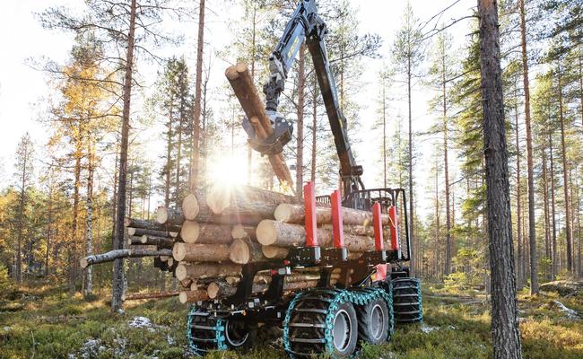 Komatsu 855 forwarder working in forest