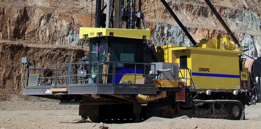 Komatsu 320XPC blasthole drills in mining site