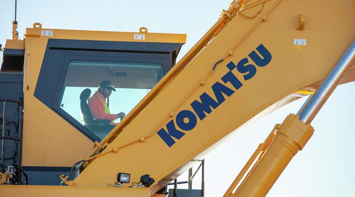 Operator inside cab of Komatsu PC2000 mining excavator