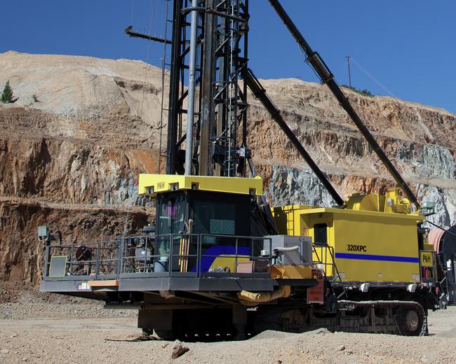 Komatsu 320XPC blasthole drills in mining site