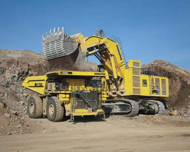 Komatsu 830E mining truck working with PC8000 mining excavator
