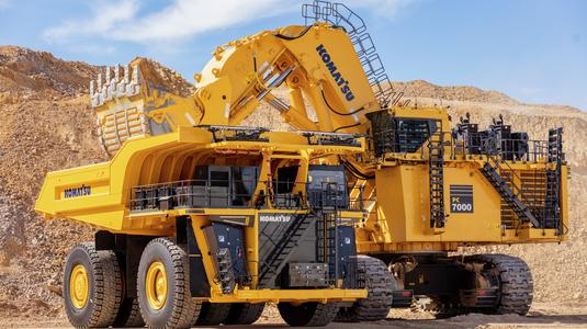 Komatsu PC7000 excavator loading Komatsu mining truck