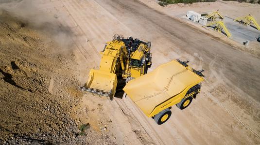 Drone image of Komatsu PC7000 excavator and mining truck
