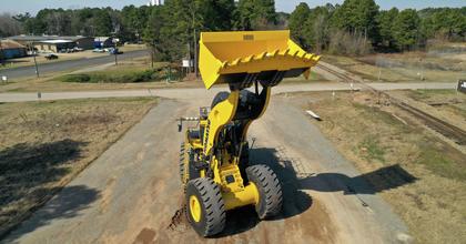 WE1850 mining wheel loader with bucket lifted